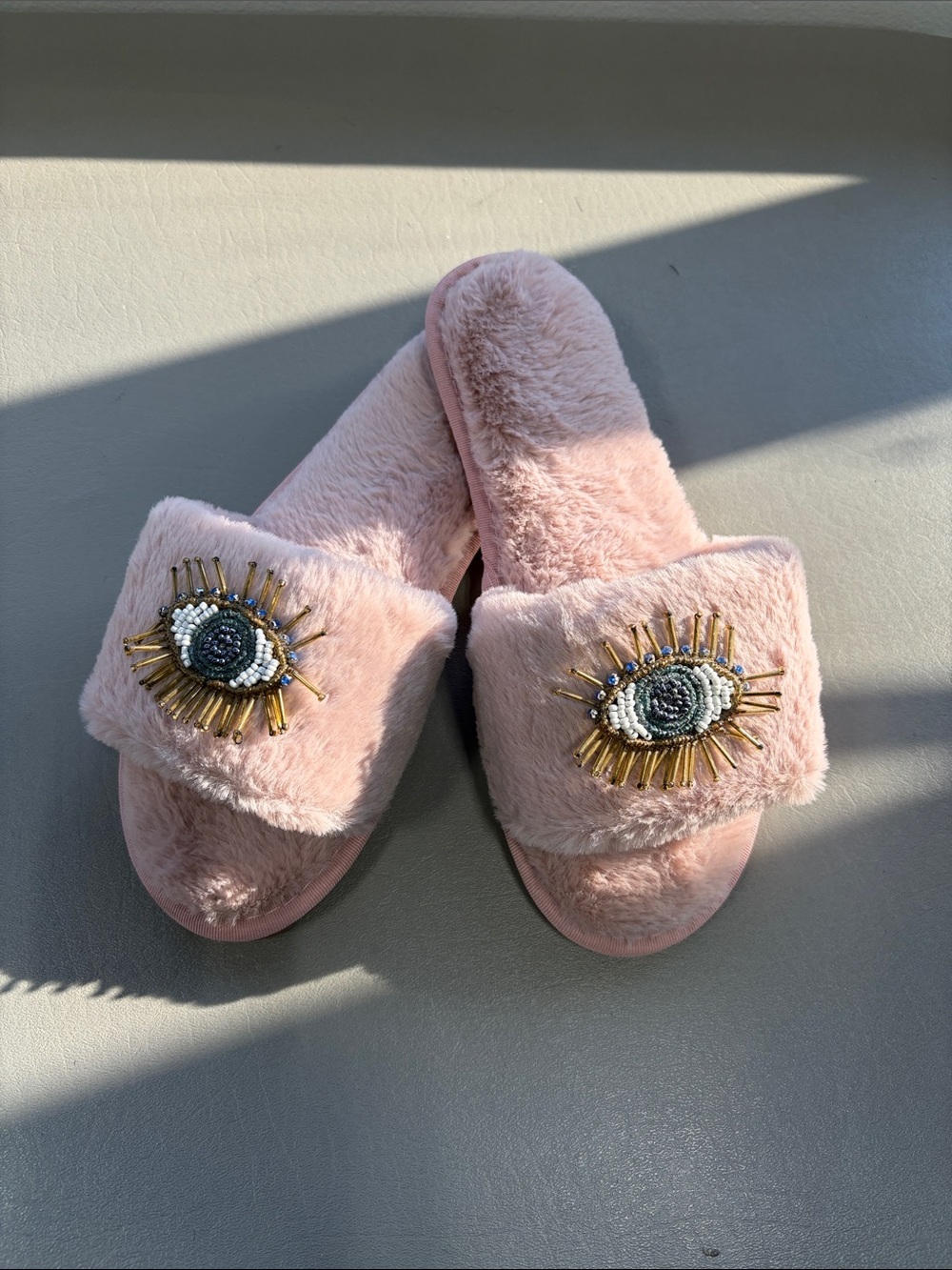NWOT Pink Faux Fur Eye Embellished Slide Slippers